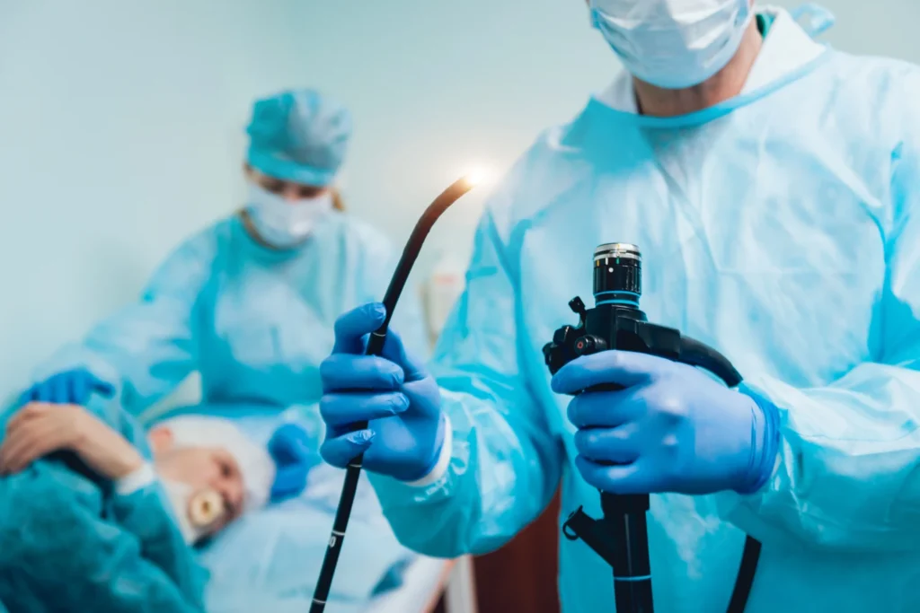 Patient with a thin nasally inserted catheter for 24-hour esophageal pH monitoring