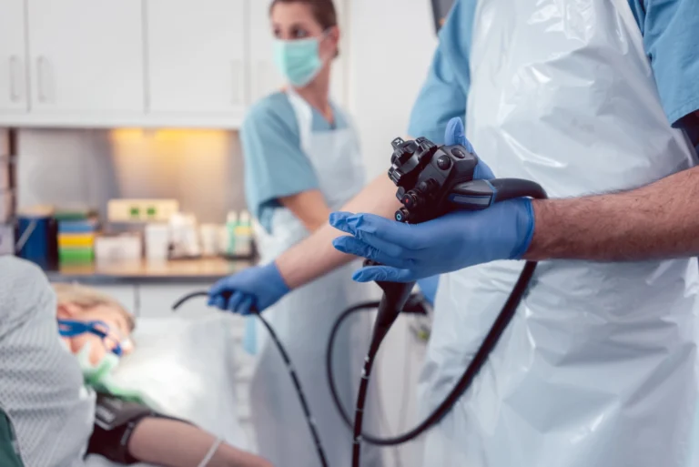 Team of doctors performing endoscopy for Gastric Band Removal